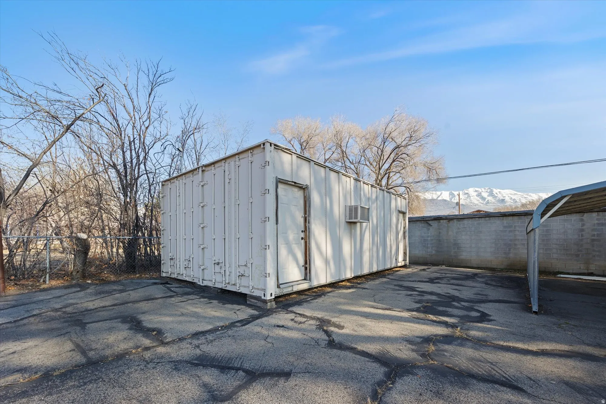 View of outbuilding featuring a mountain view