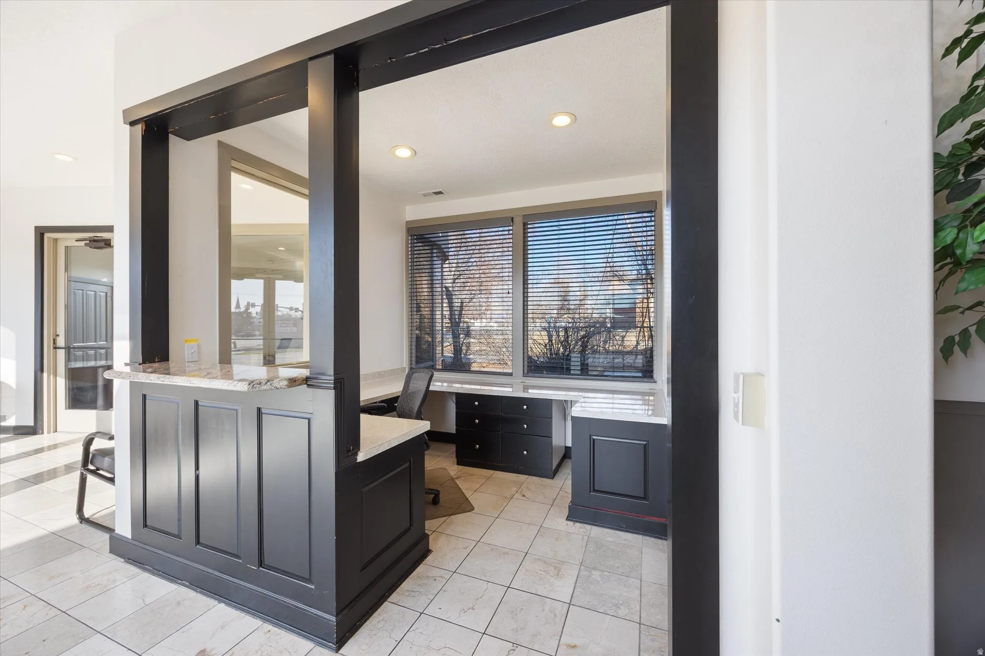 Bathroom featuring vanity and recessed lighting