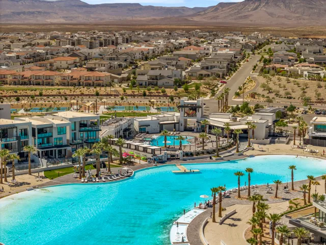 Community pool with a mountain view and a residential view