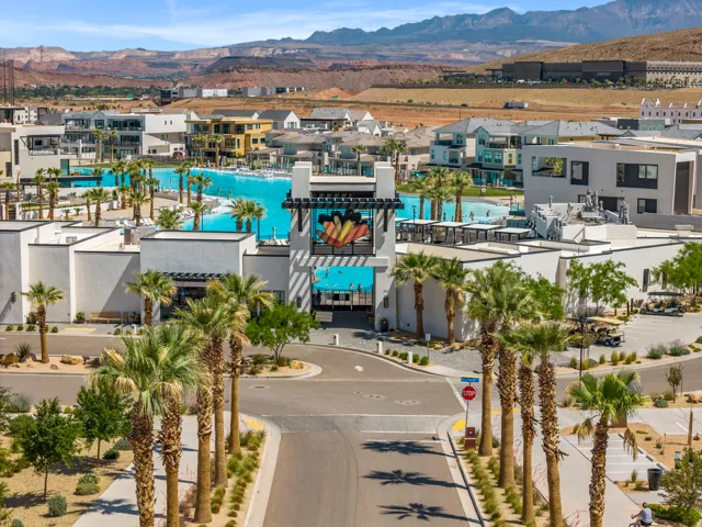 Bird's eye view of a mountain backdrop and a pool