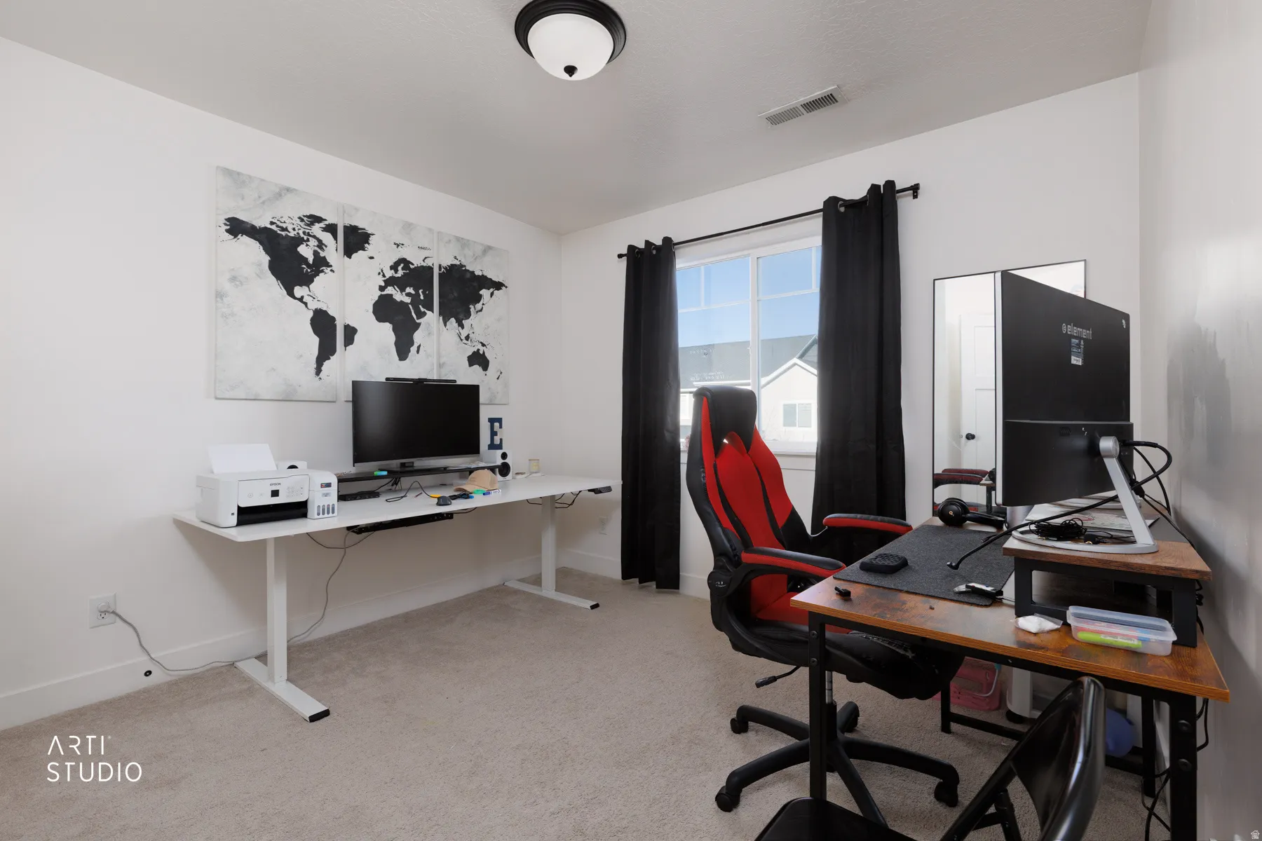 Office area with light carpet and baseboards