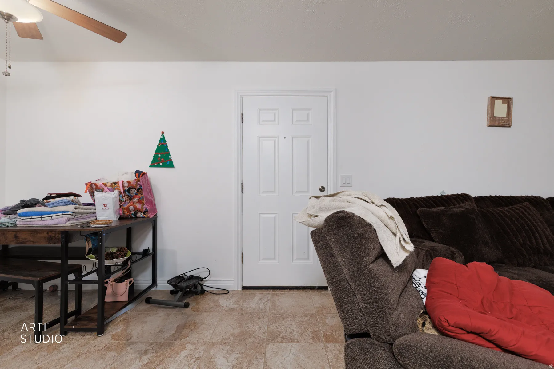 Office area featuring ceiling fan and baseboards
