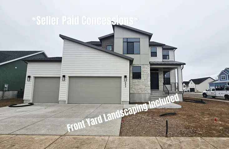 Modern home with covered porch, an attached garage, concrete driveway, and stone siding