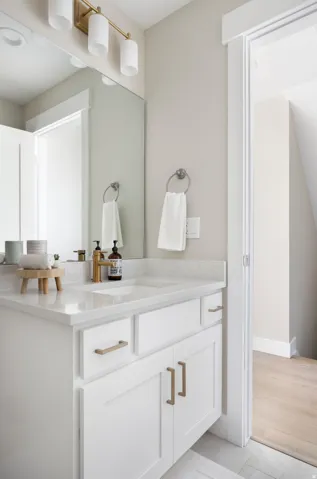 Bathroom with vanity and light tile patterned floors