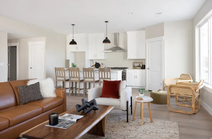 Living area featuring wood finished floors and recessed lighting