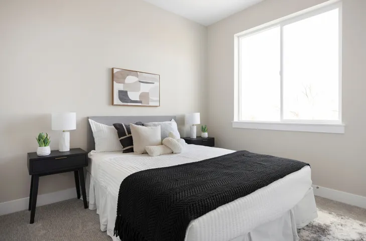 Bedroom featuring baseboards and carpet flooring