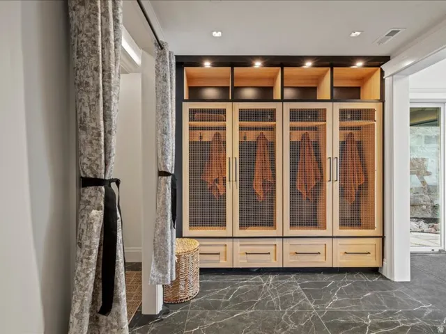 Mudroom with recessed lighting