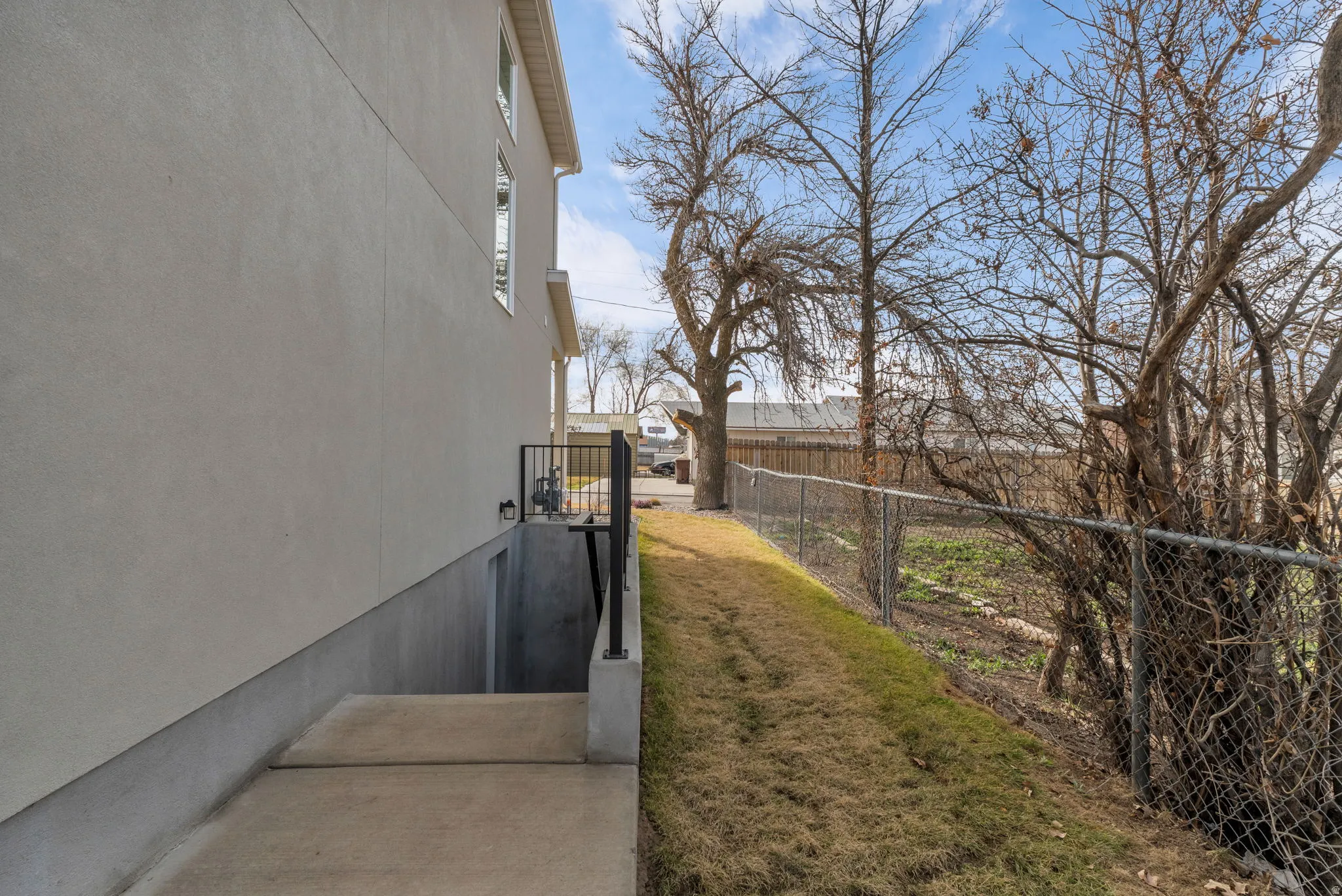 View of property exterior with stucco siding