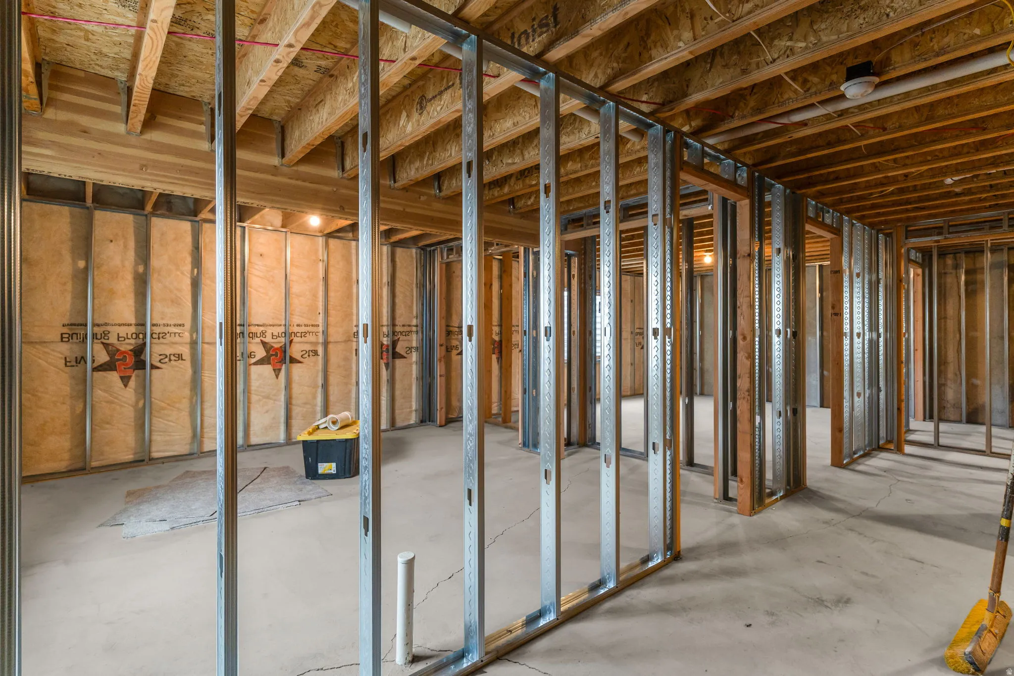 Miscellaneous room featuring concrete floors