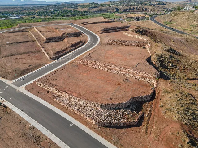 Aerial view of property's location featuring rural landscape and a mountainous background