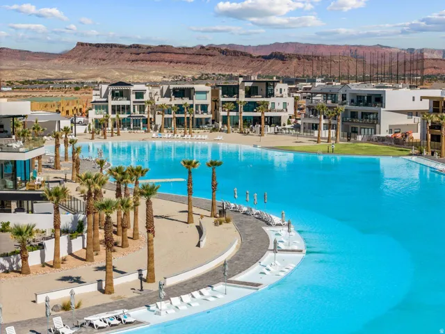 Community pool featuring a mountain view, a patio area, and a residential view