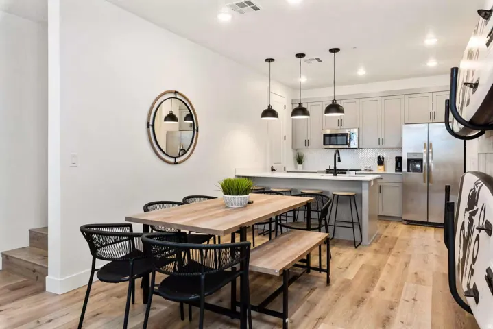 Dining room featuring light wood-style flooring and recessed lighting