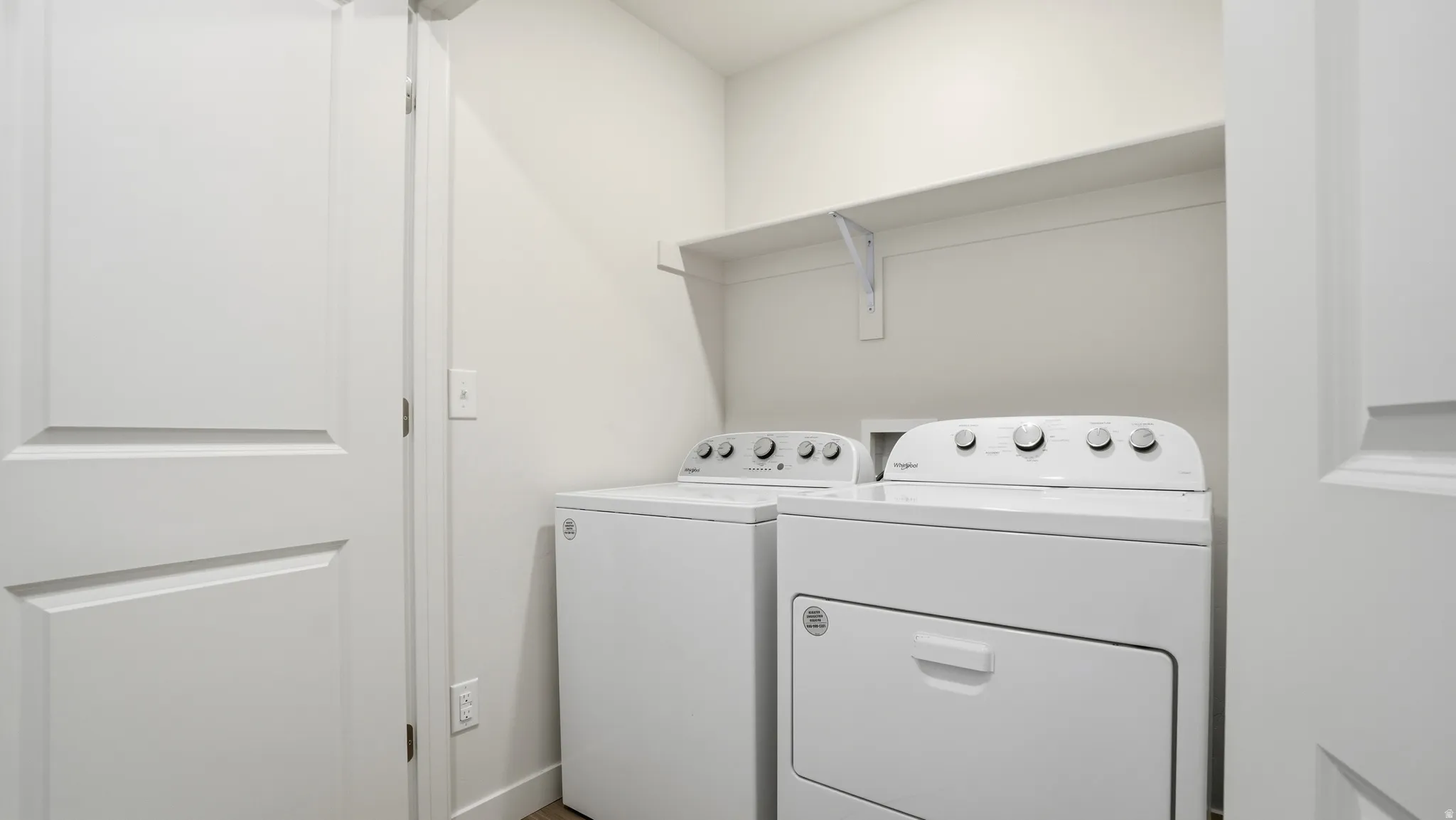 Laundry area with separate washer and dryer