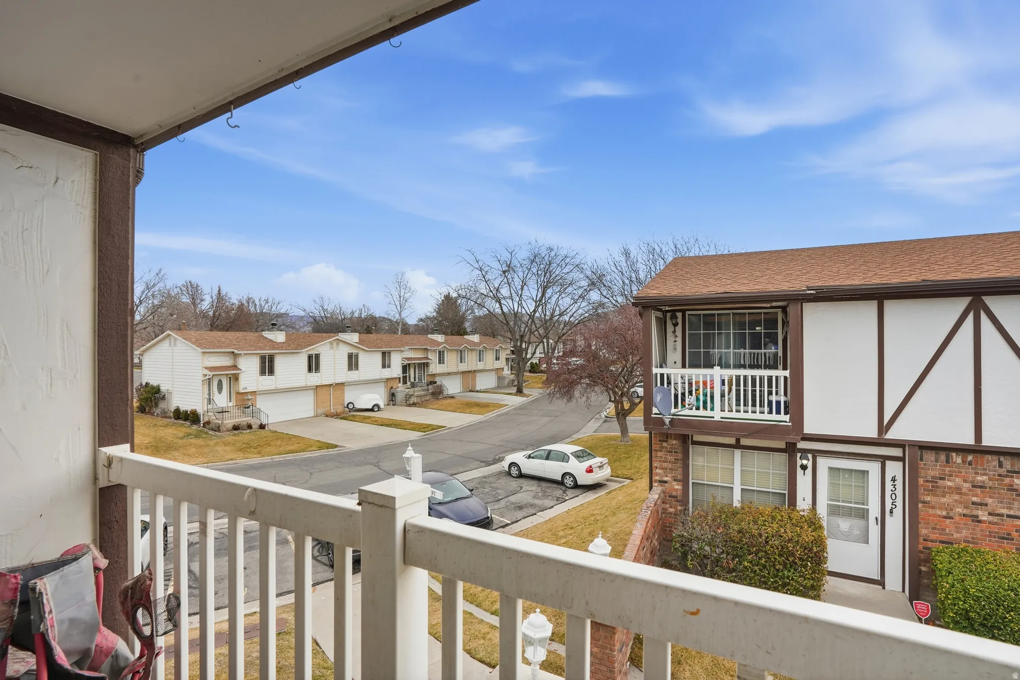 Balcony featuring a residential view