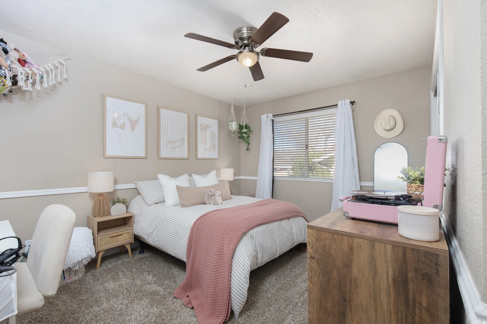 Bedroom with carpet flooring and ceiling fan