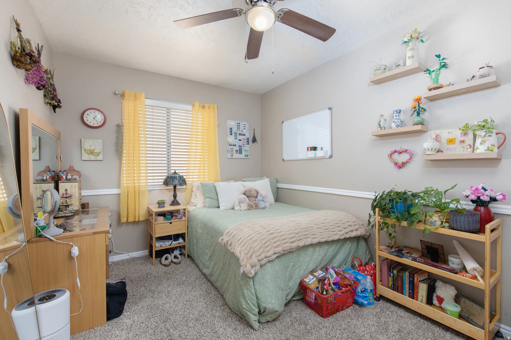 Bedroom featuring carpet and ceiling fan