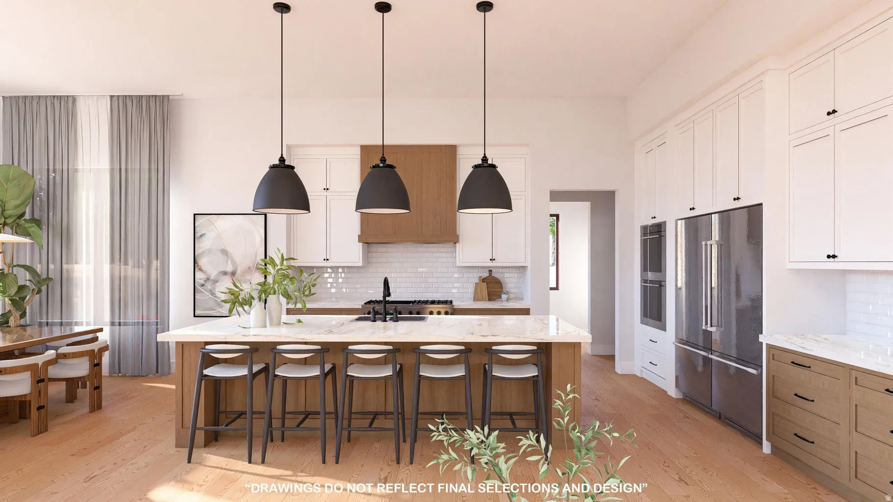 Kitchen with dual tone cabinets, light stone countertops, stainless steel appliances, decorative light fixtures, and light wood-style floors