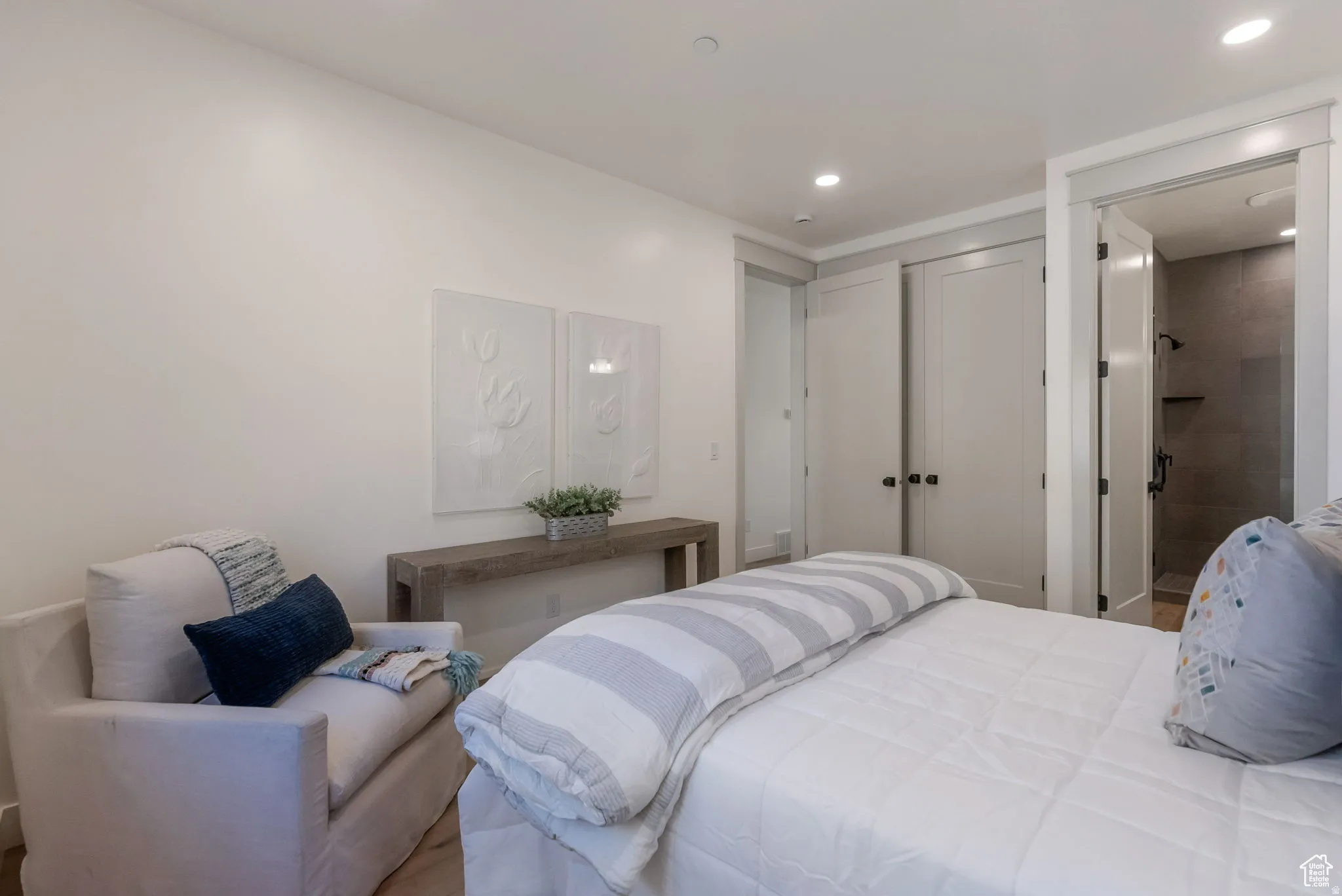 Bedroom with recessed lighting and ensuite bathroom
