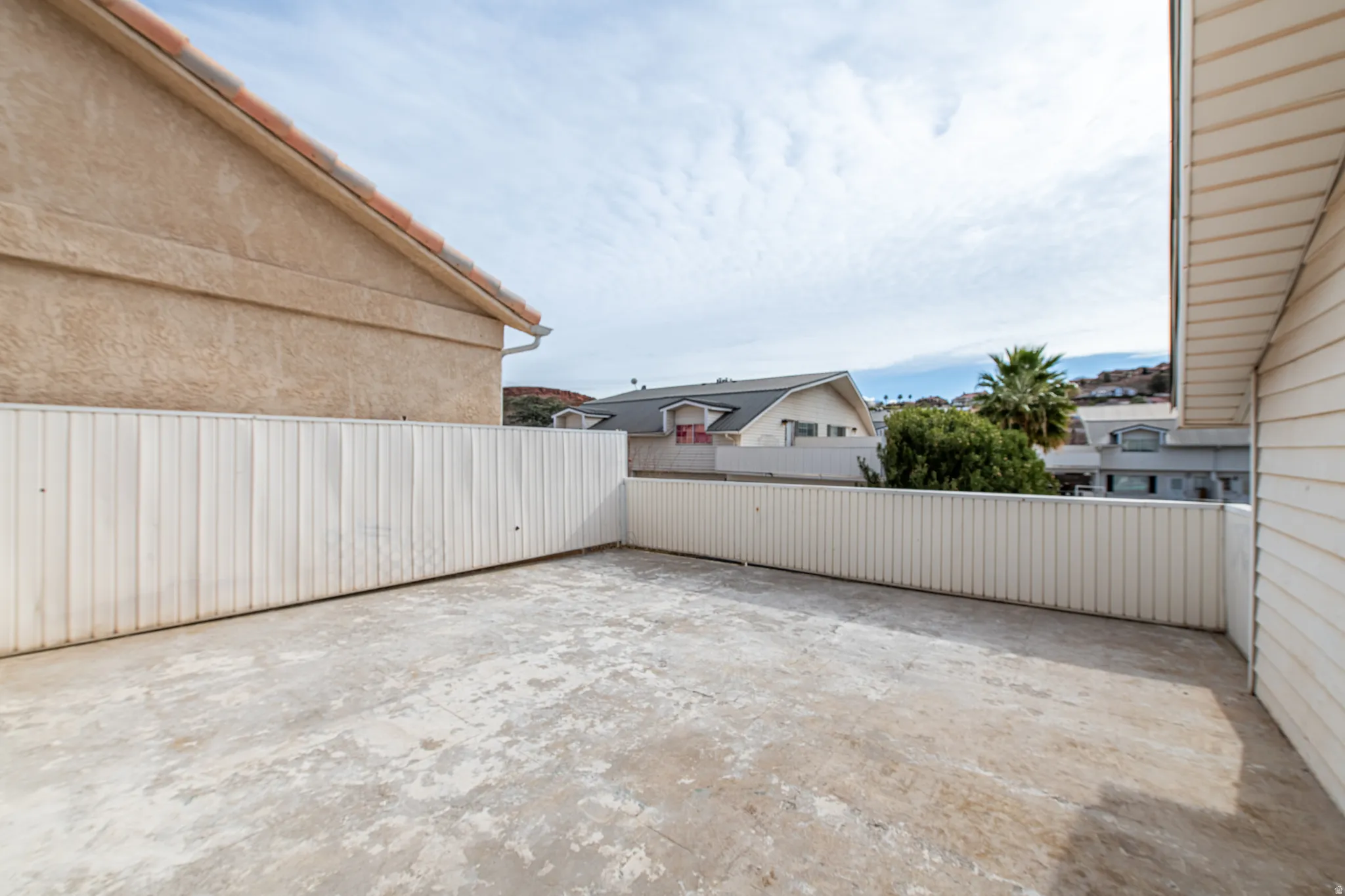 View of fenced backyard