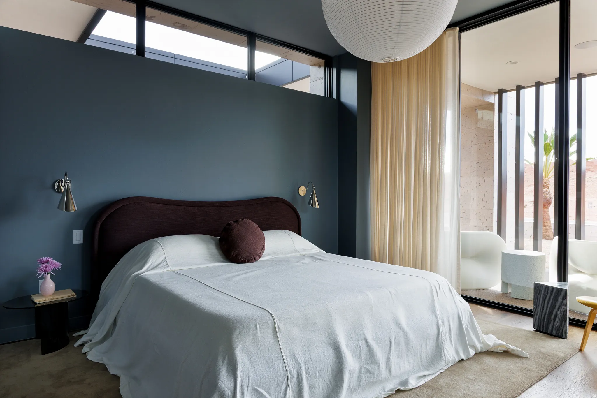 Bedroom 2 with a Floor to Celing Windows, Exterior Door, & Speakers