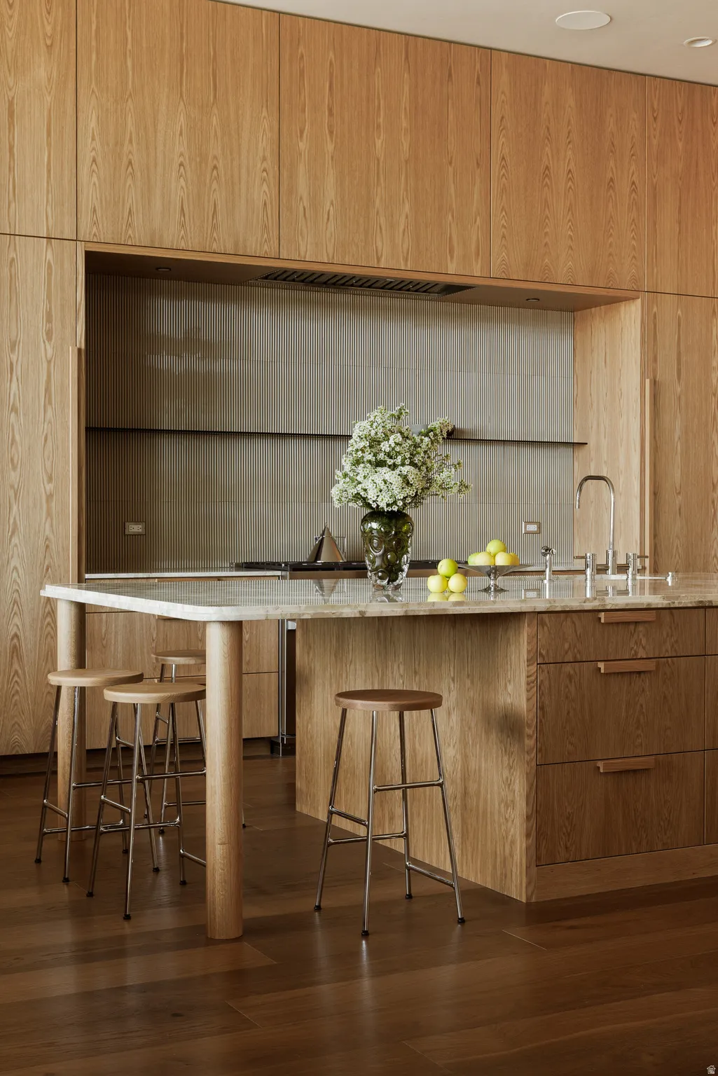 Gorgeous Marble Countertops with Warm Wood Cabinetry