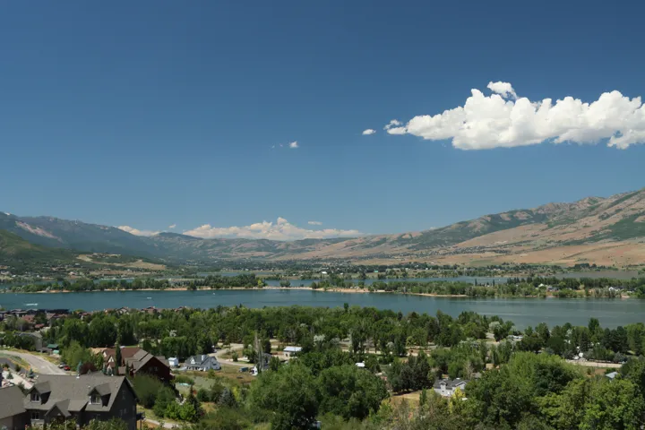 Mountain view featuring a nearby body of water