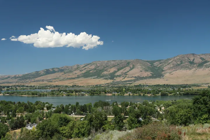 View of mountain backdrop with a large body of water