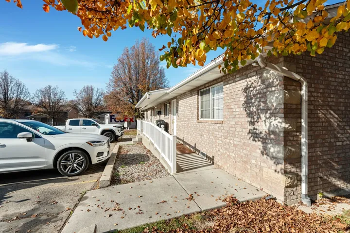 View of property exterior featuring brick siding
