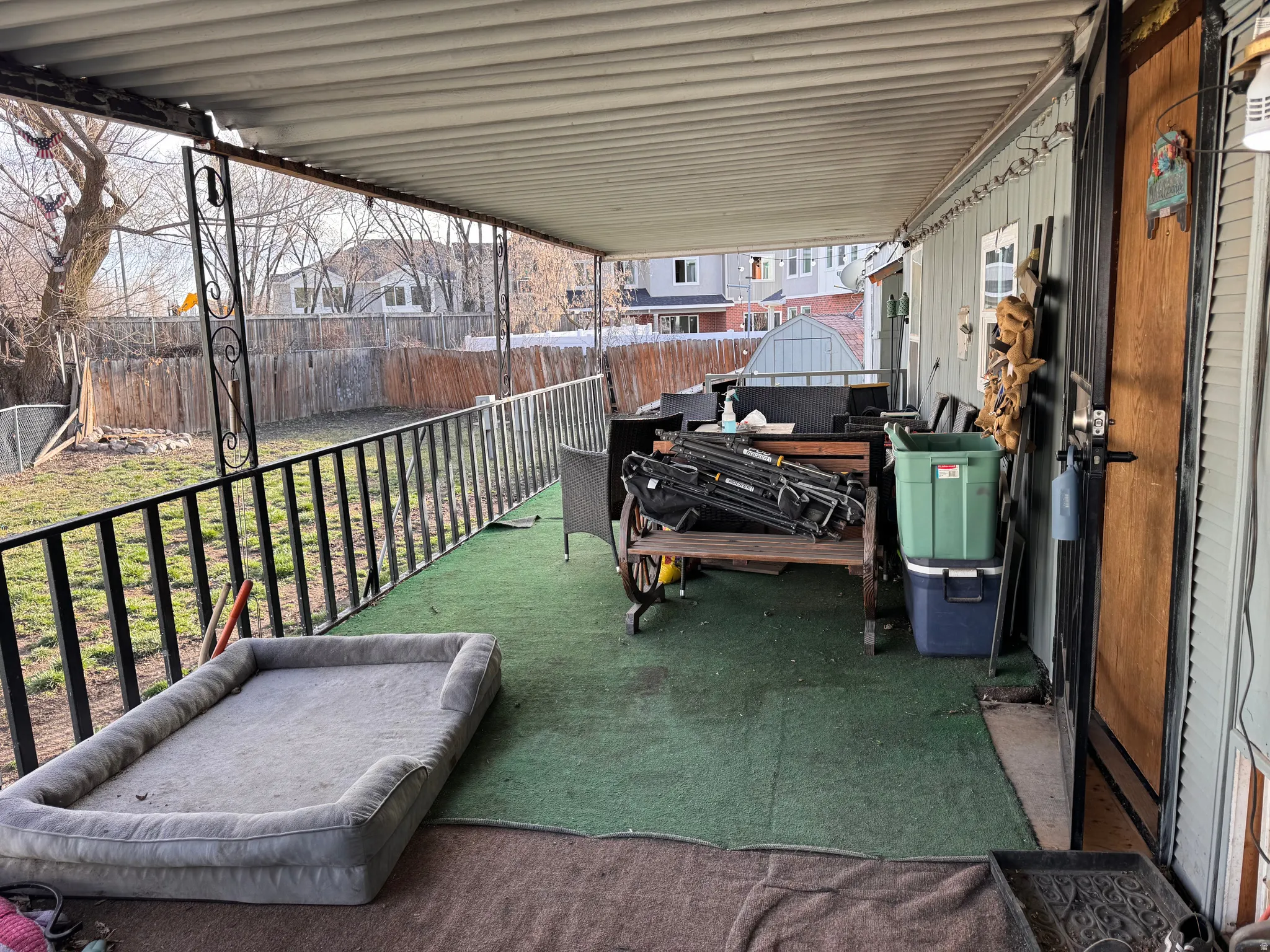 View of fenced backyard