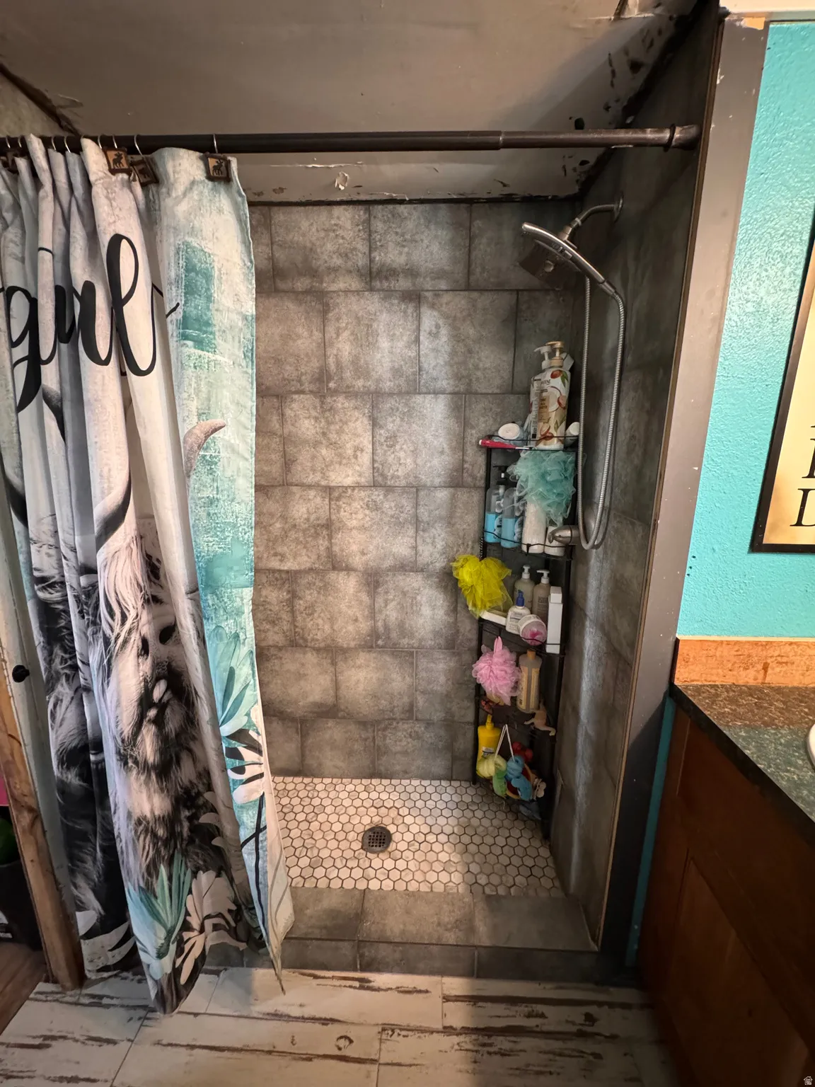 Full bathroom with a shower stall and vanity