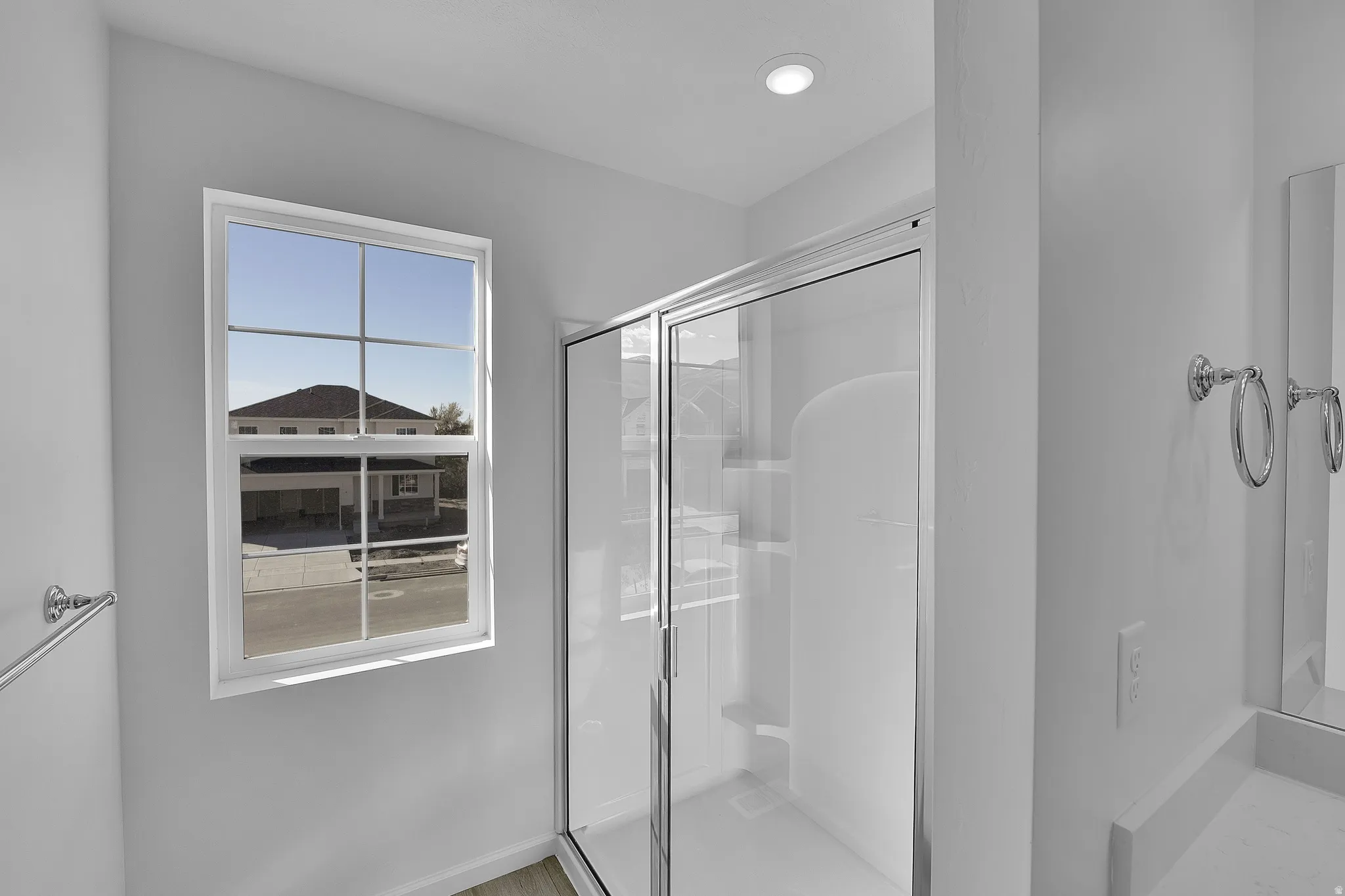 Full bath with a shower stall