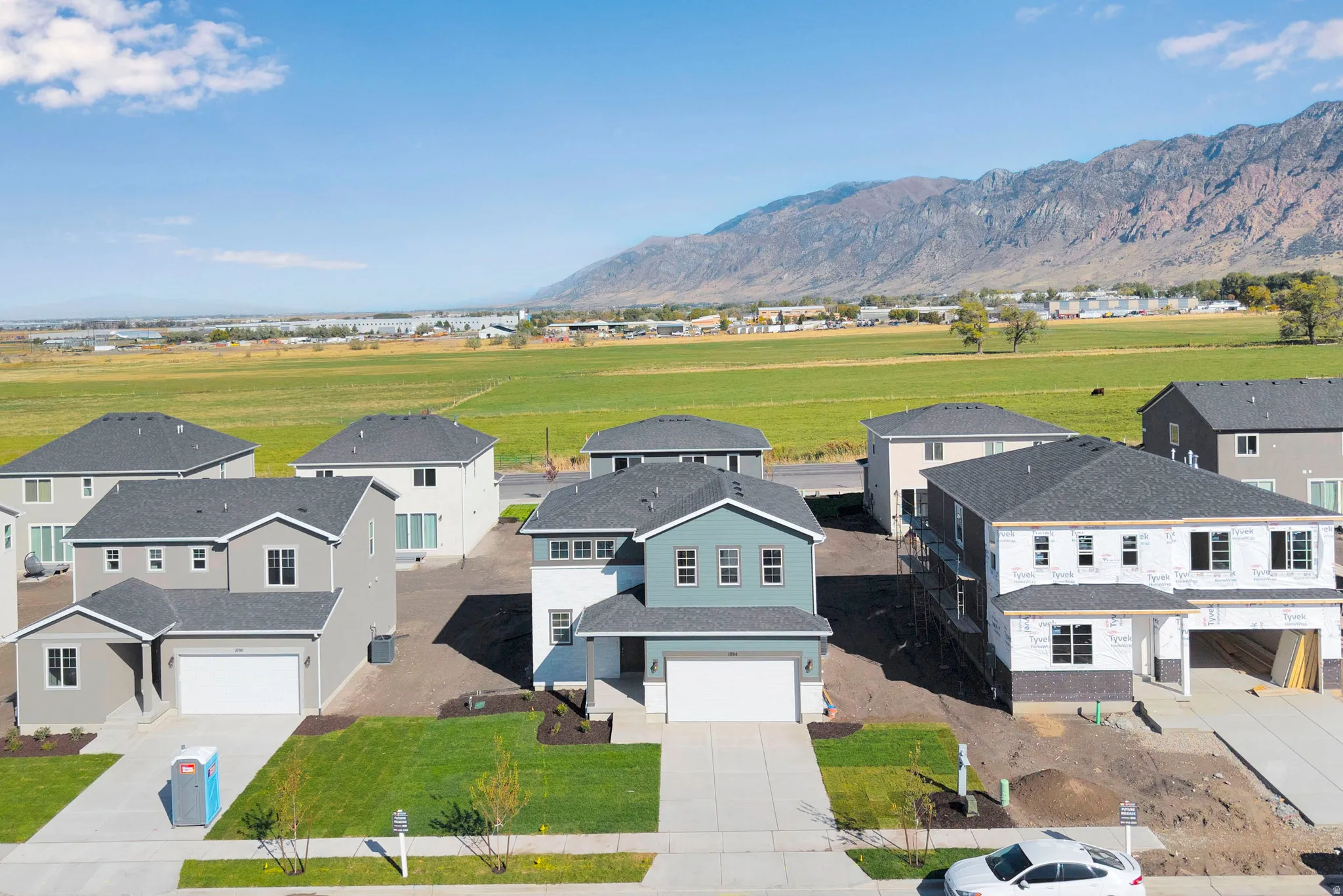 Aerial view of residential area with mountains