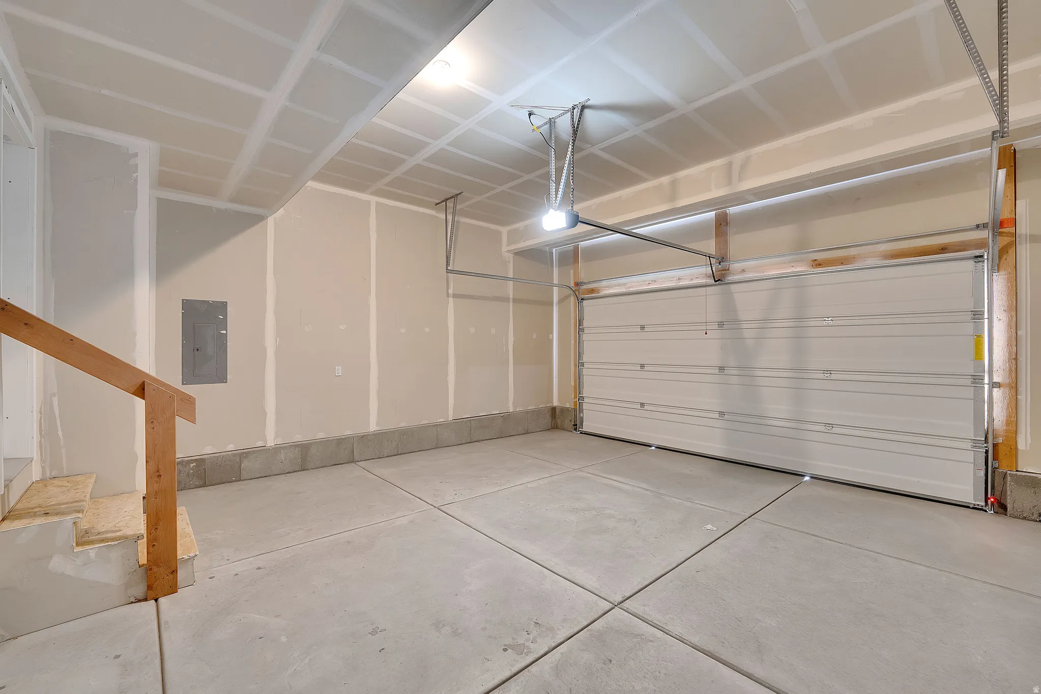 Garage featuring electric panel