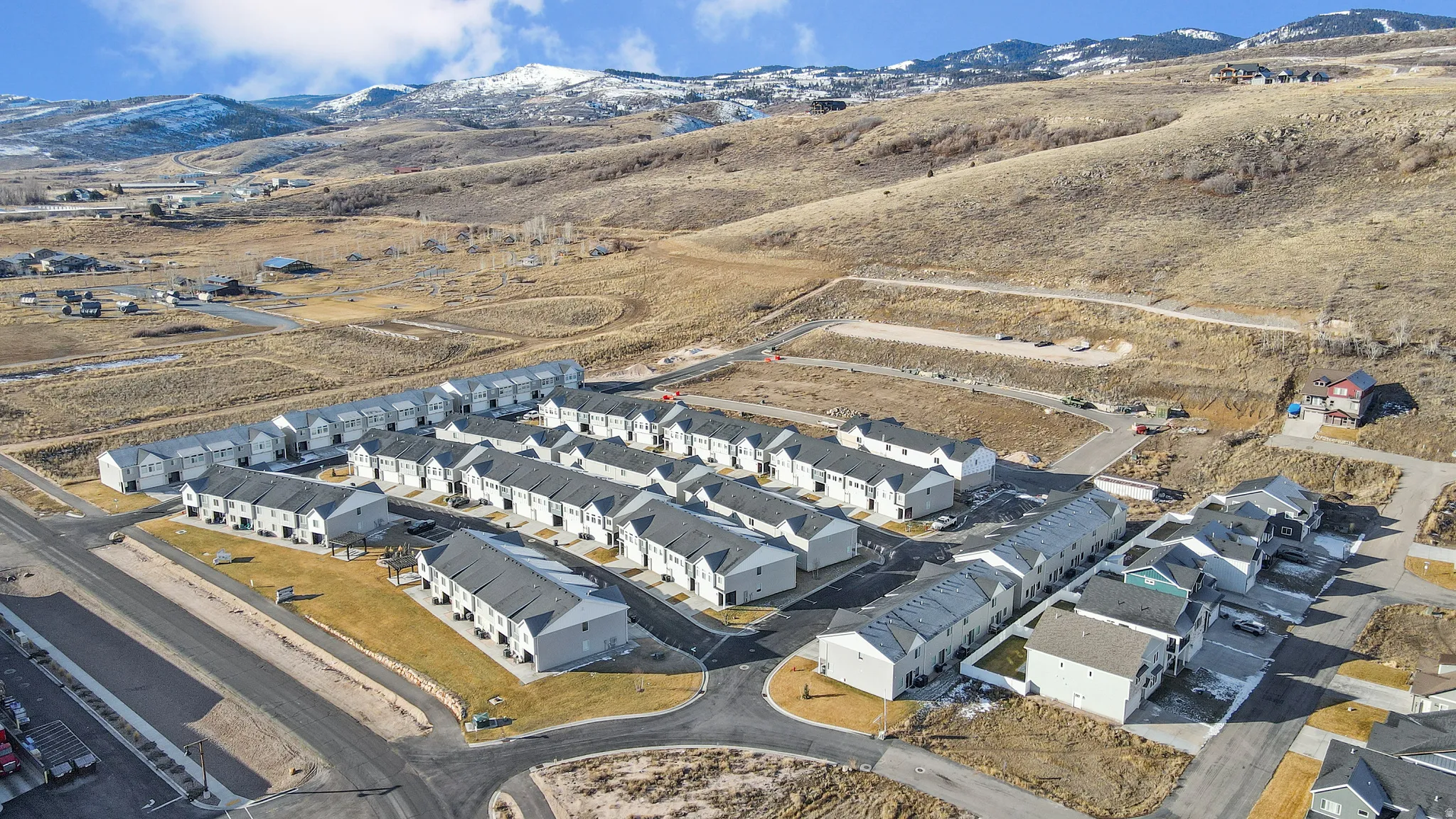 Aerial perspective of suburban area featuring mountains