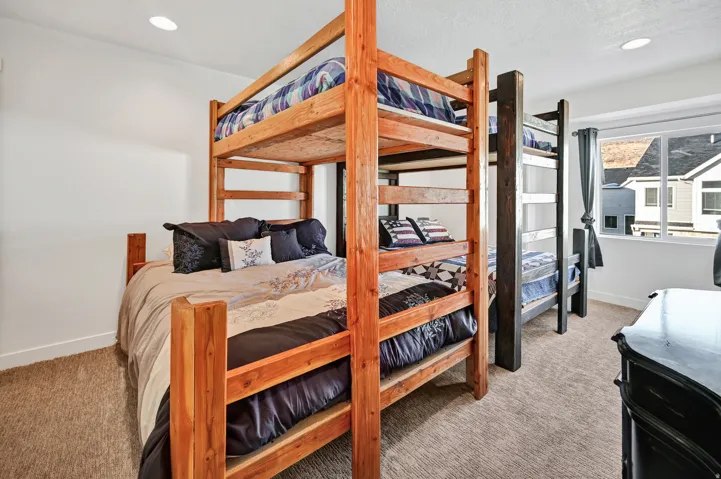 Bedroom featuring recessed lighting and light colored carpet