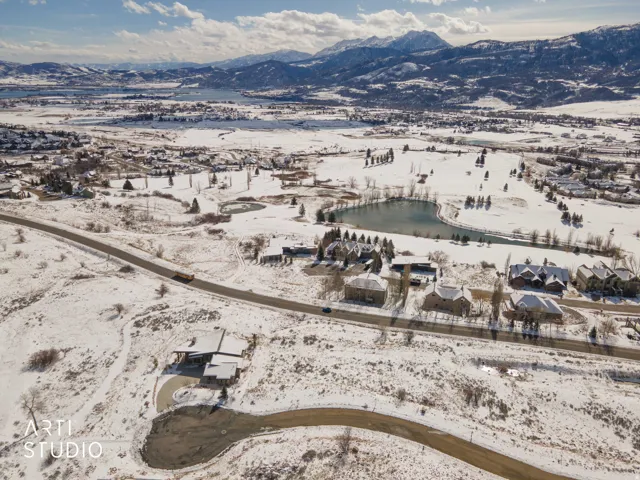 Snowy aerial view with a mountain view