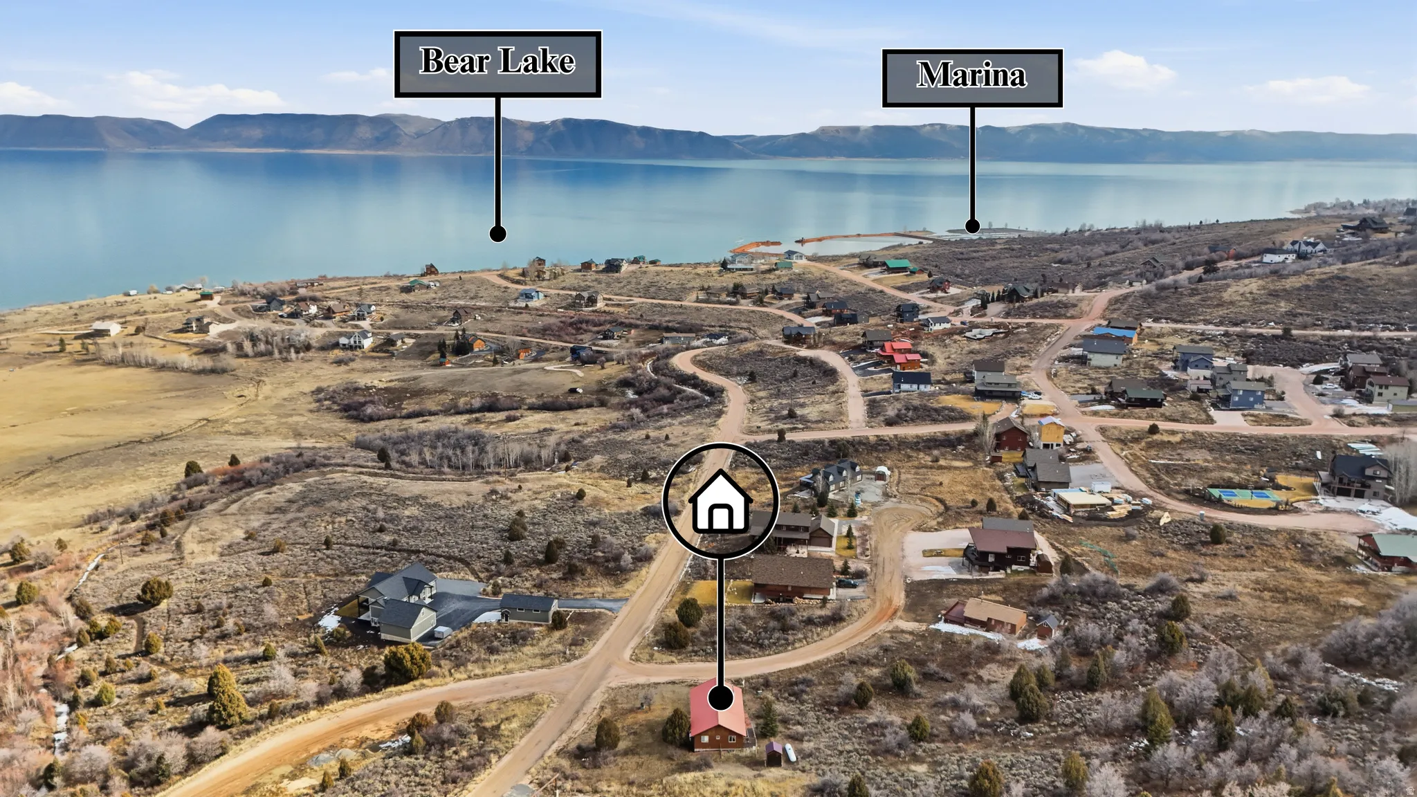 View of property location with a water and mountain view