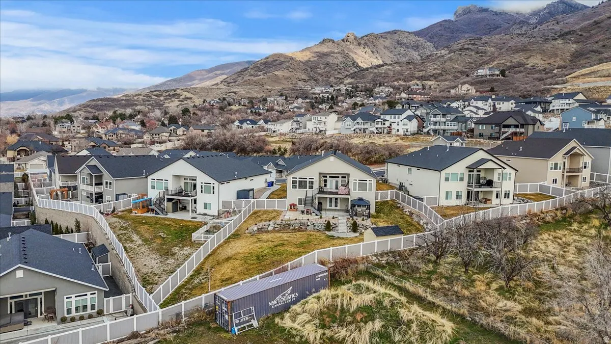 Aerial view of residential area with a mountainous background