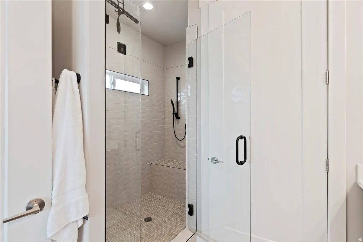 Bathroom featuring a shower stall