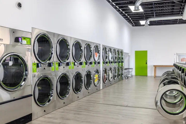 Laundry area with a high ceiling