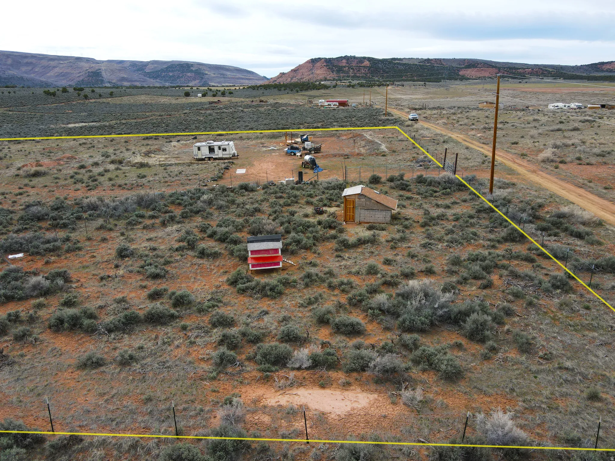View of rural area with property boundaries highlighted and mountains
