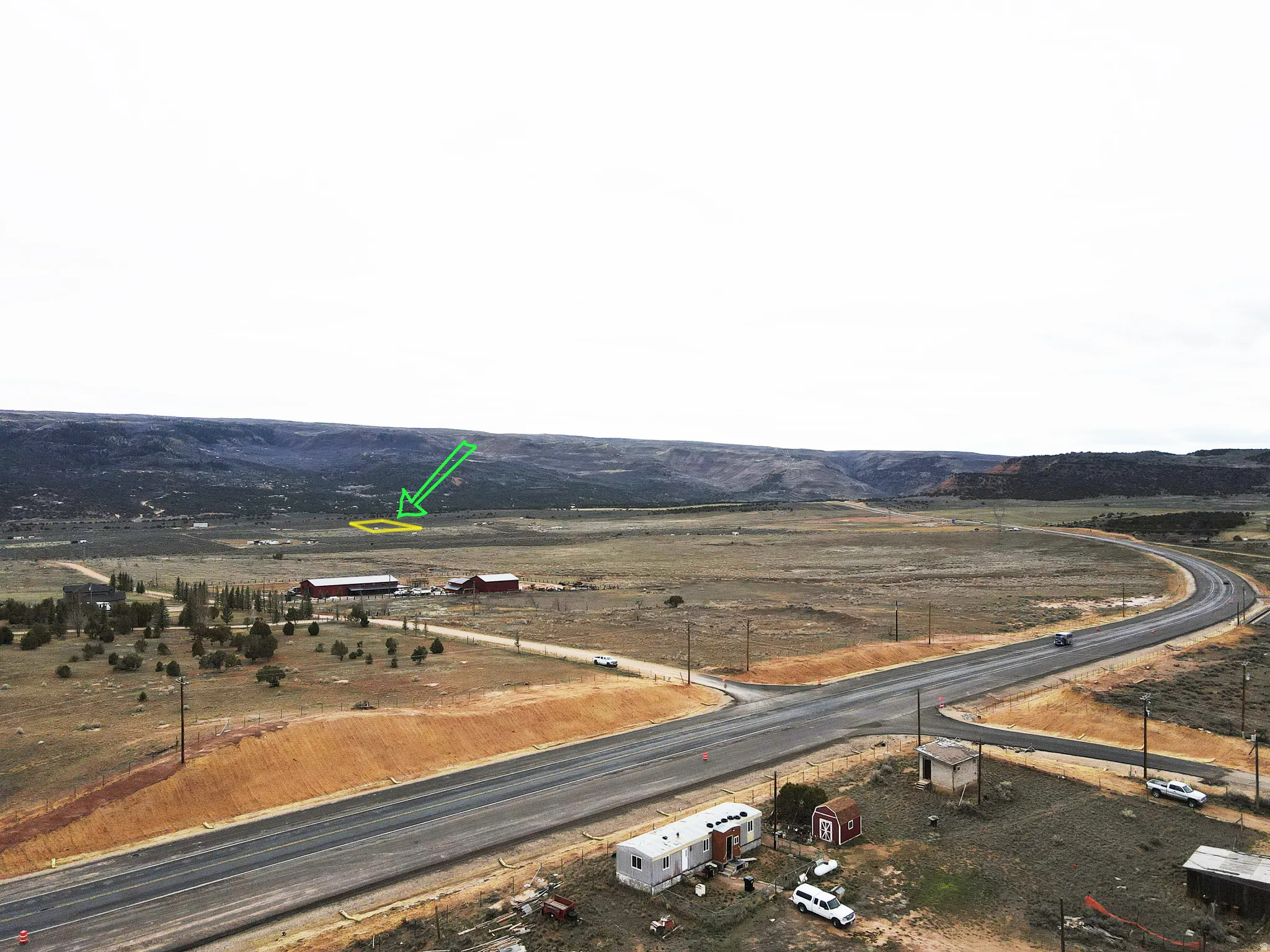 Drone / aerial view of a mountainous background