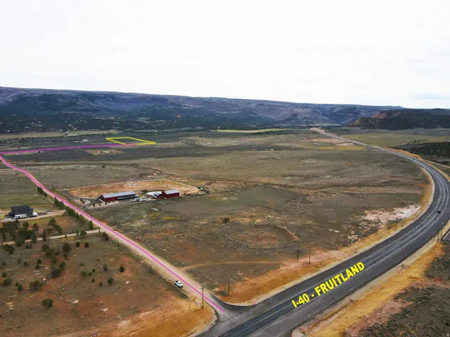 View of rural area with a mountain backdrop and property parcel outlined
