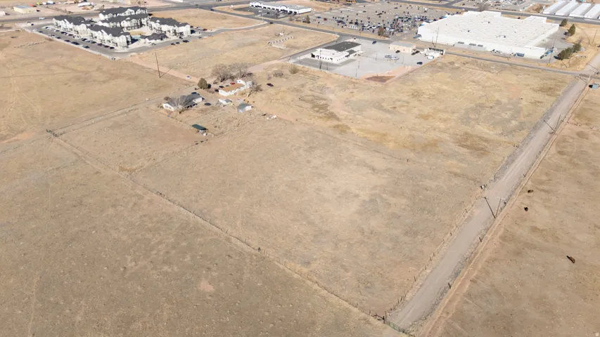 View of property location with industrial structures