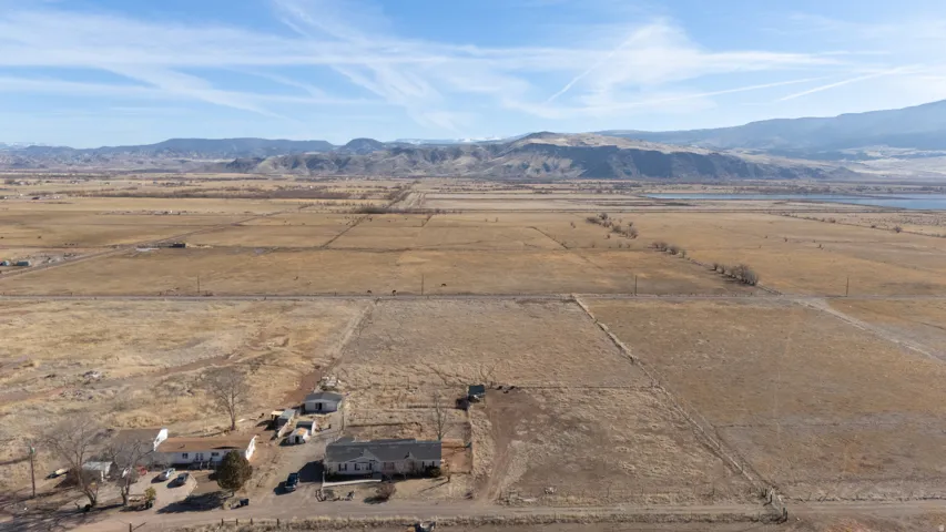 Overview of rural landscape with a mountain backdrop