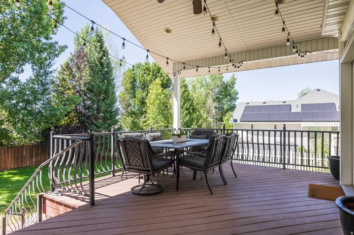 Wooden terrace featuring outdoor dining space