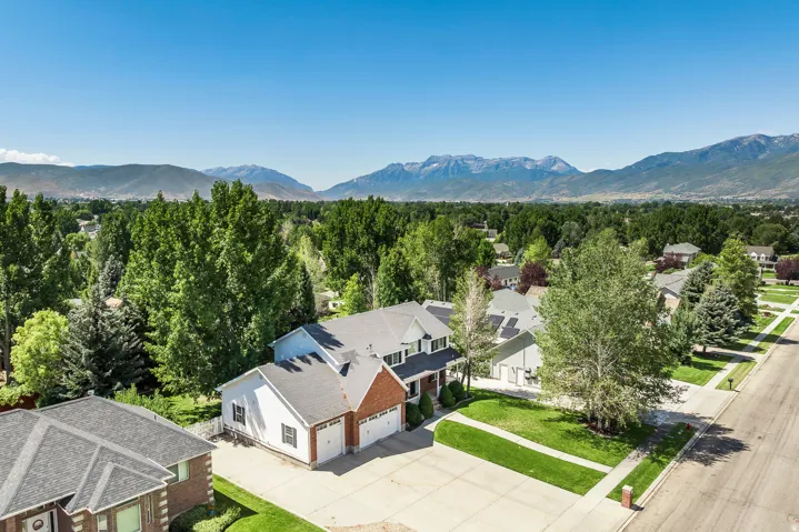 Aerial view of residential area with a mountainous background