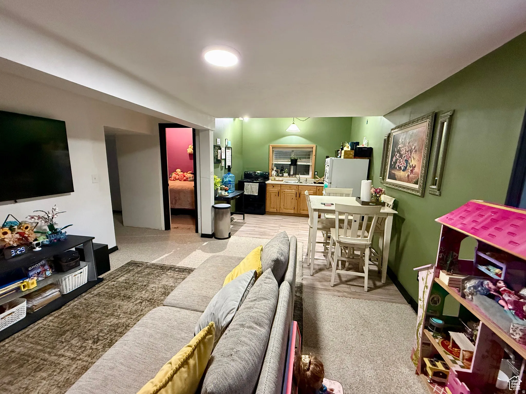 Living area with light carpet