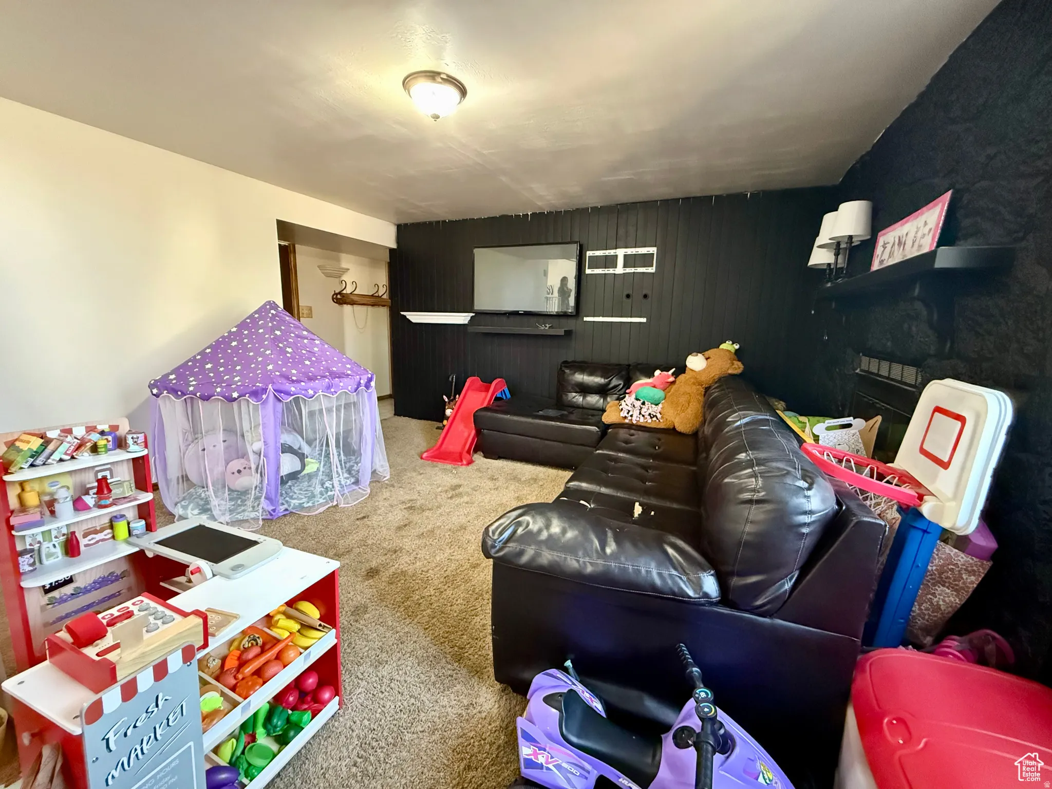 Living room featuring carpet floors