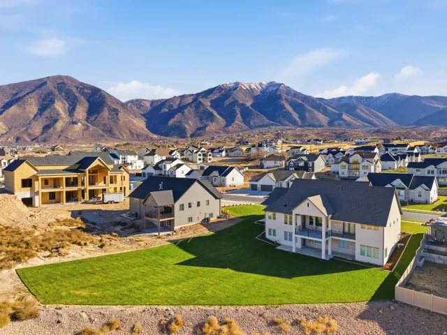 View of mountain background featuring nearby suburban area